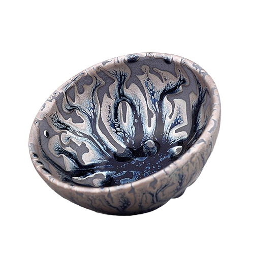 A set of two artistic ceramic tea cups with a swirling blue and gray pattern.