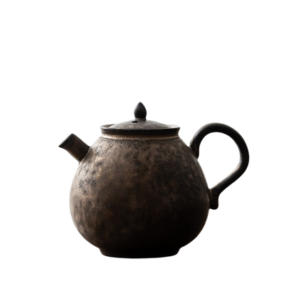 A retro style tenmoku teapot with a lid and spout, predominantly in a dark color.