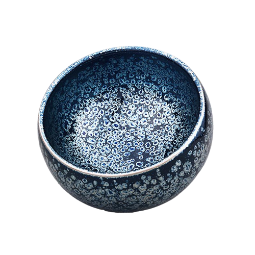 A round ceramic tea cup with a blue and gray speckled pattern.